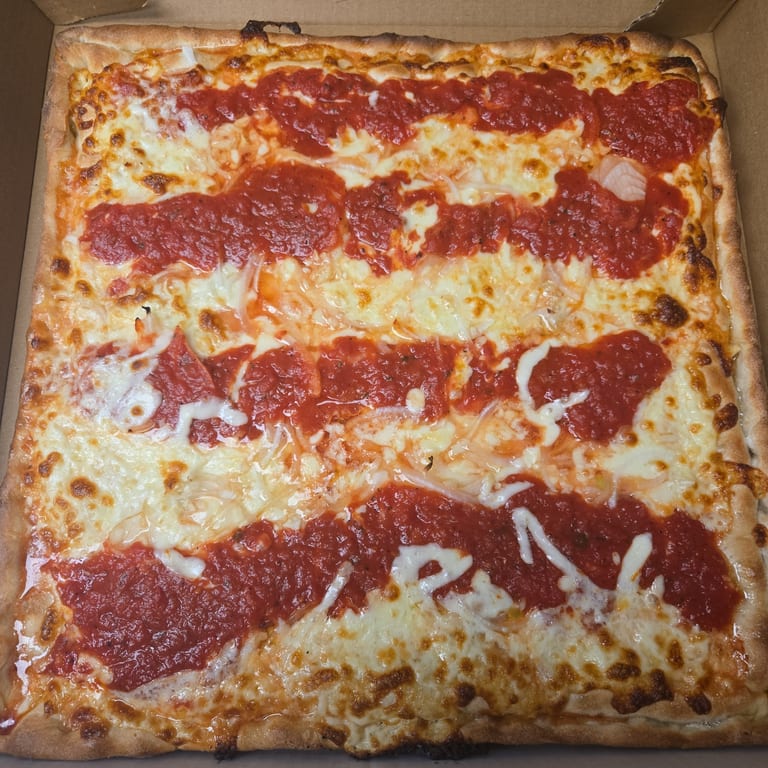 Savor Our Authentic Pizza